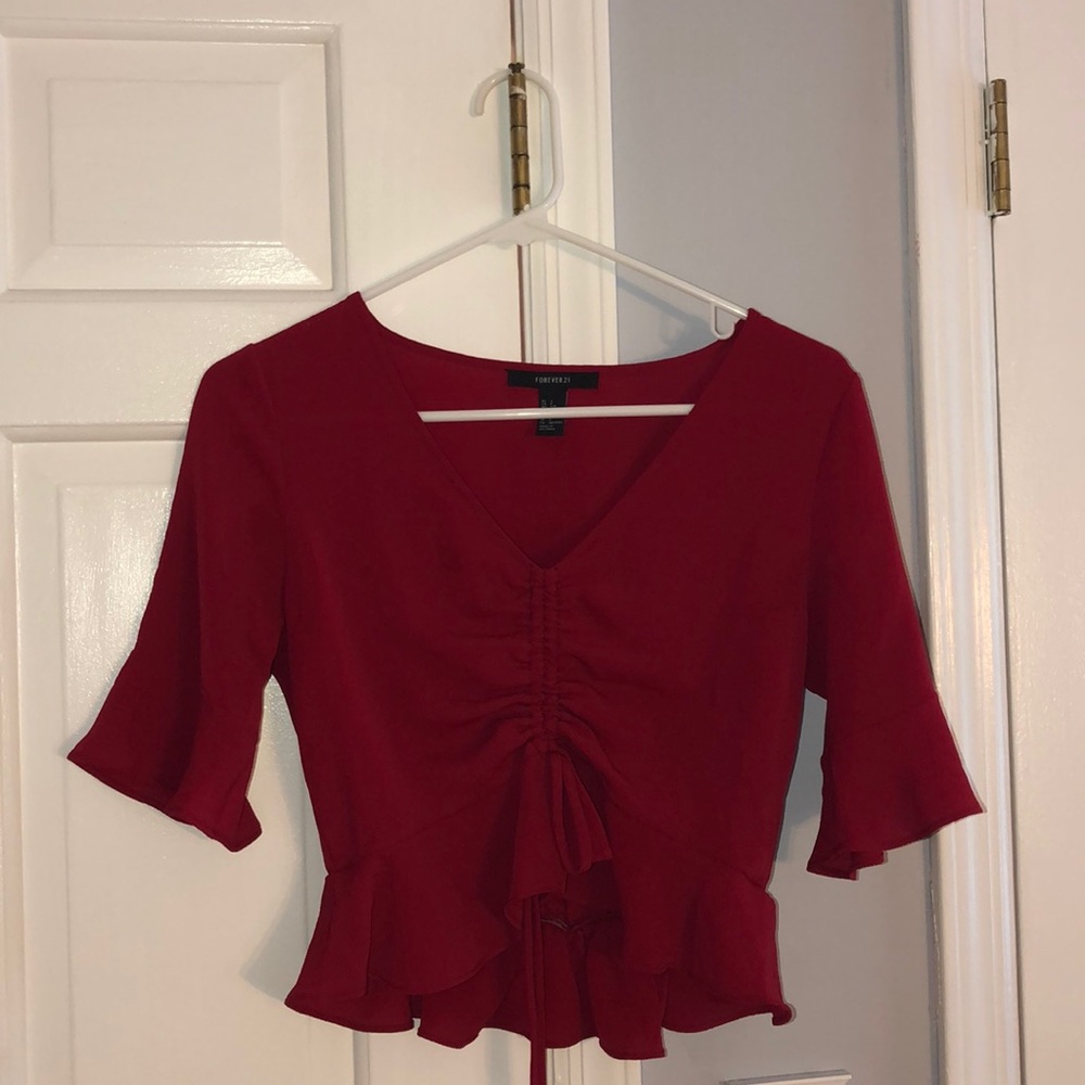 Red cropped quarter sleeve shirt